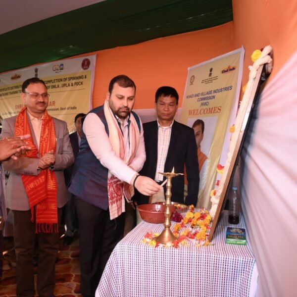 KVIC Chairman interacts with people undergoing training in spinning and weaving who have left the path of militancy